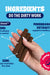 Hand holding peanut butter flavored dental chews with Bacti-Shield, pomegranate extract, and zinc for pet oral health
