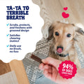 Dog enjoying dental treat for fresh breath, 94% of dogs love it, no brush needed