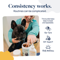 Woman giving pet supplements to black French Bulldog for ear care, gut support, and daily wellness